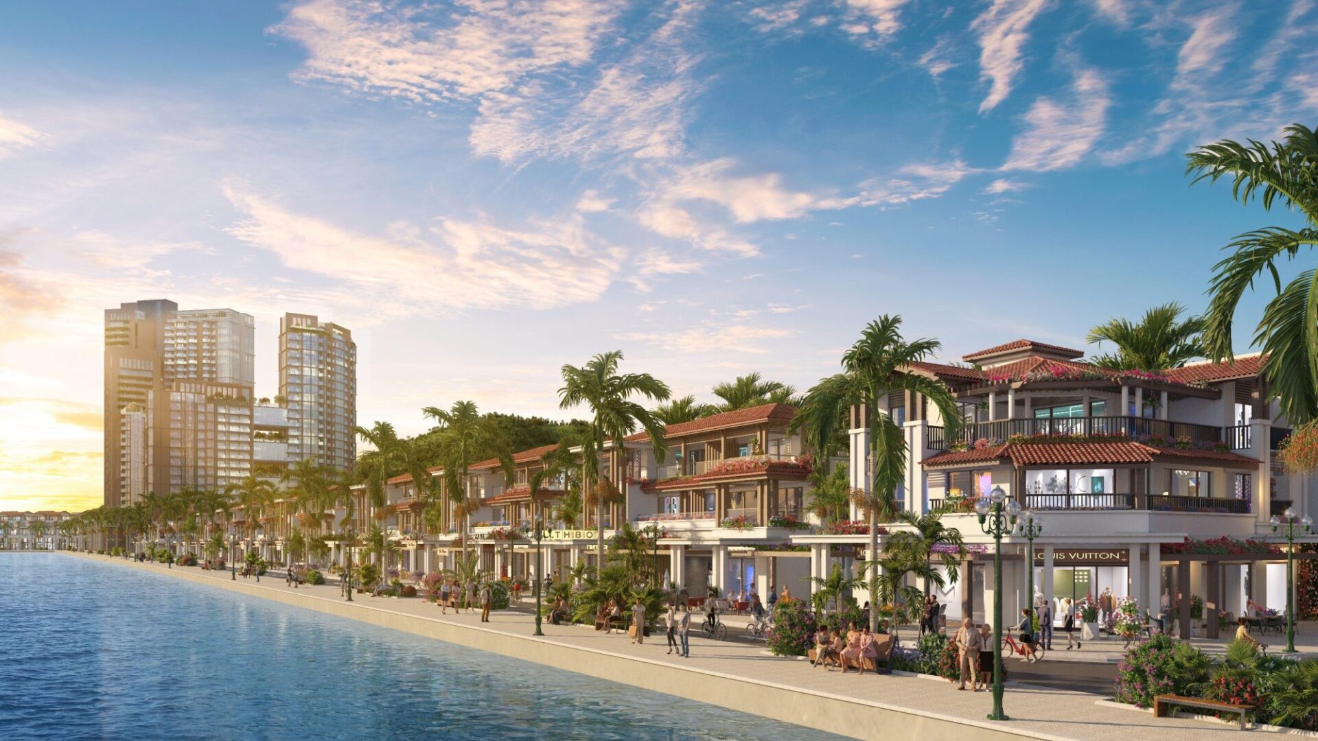 Dãy townhouse – shophouse quây quần bên hàng dừa xanh mát, mái ngói đỏ ấm áp hòa quyện cùng lối kiến trúc châu Âu tinh tế, khiến mỗi căn nhà như một “ngôi làng” ven sông đẳng cấp