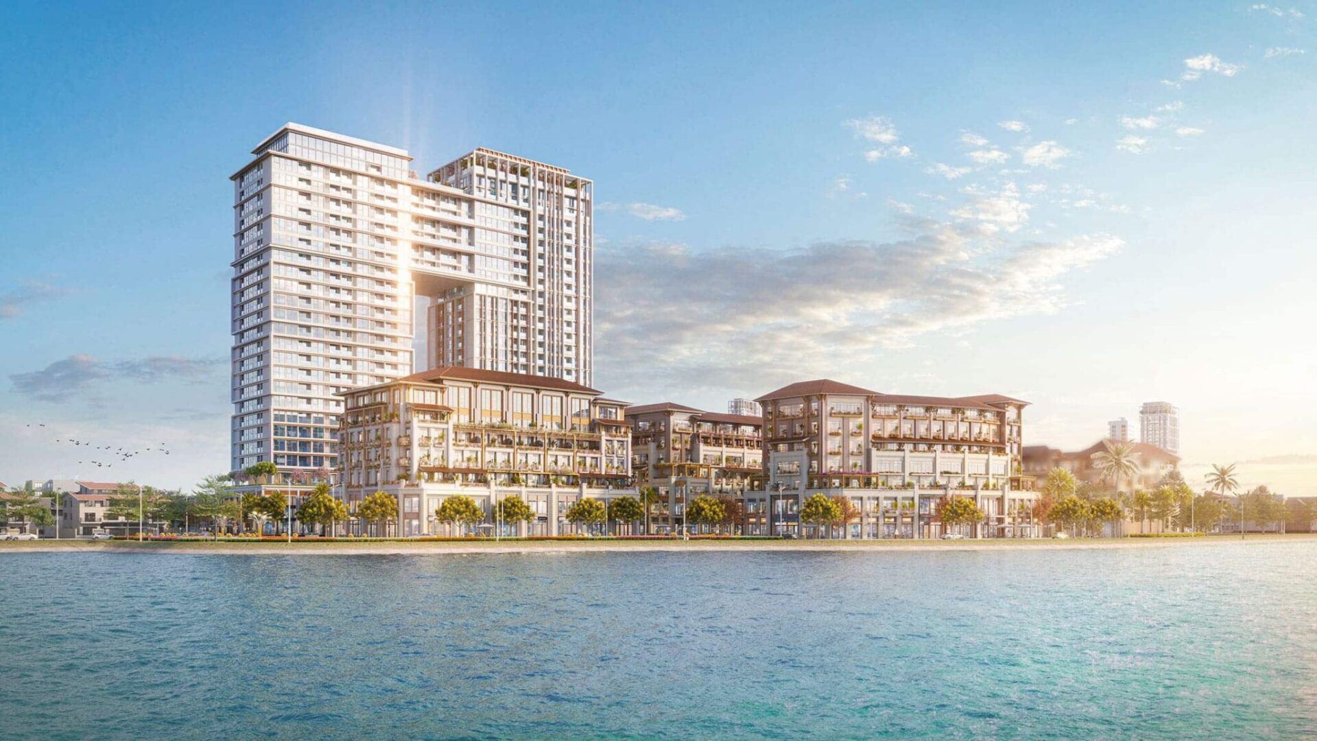 Góc chụp từ phía sông làm bật lên thiết kế “phân khu đôi” của Sun Ponte Residence: The Ponte cao vút và The Rio ấm cúng, đan xen giữa thương mại – nghỉ dưỡng
